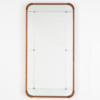 A teak veneered mirror.