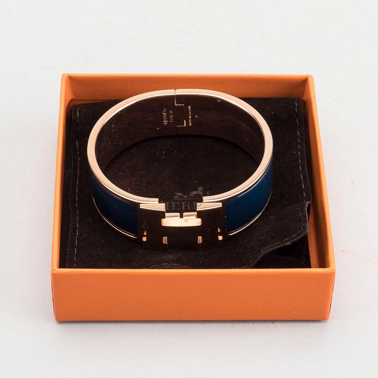 A Hermès "Clic-H" bracelet.