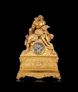 94. A French 1830/40's gilt bronze mantel clock.