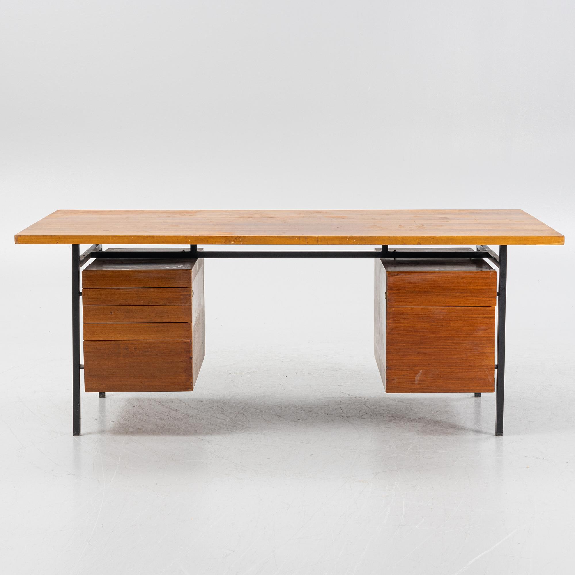 Florence Knoll, a model 590-036 walnut-veneered desk, by Nordiska Kompaniet in Sweden for Knoll International, 1962.
