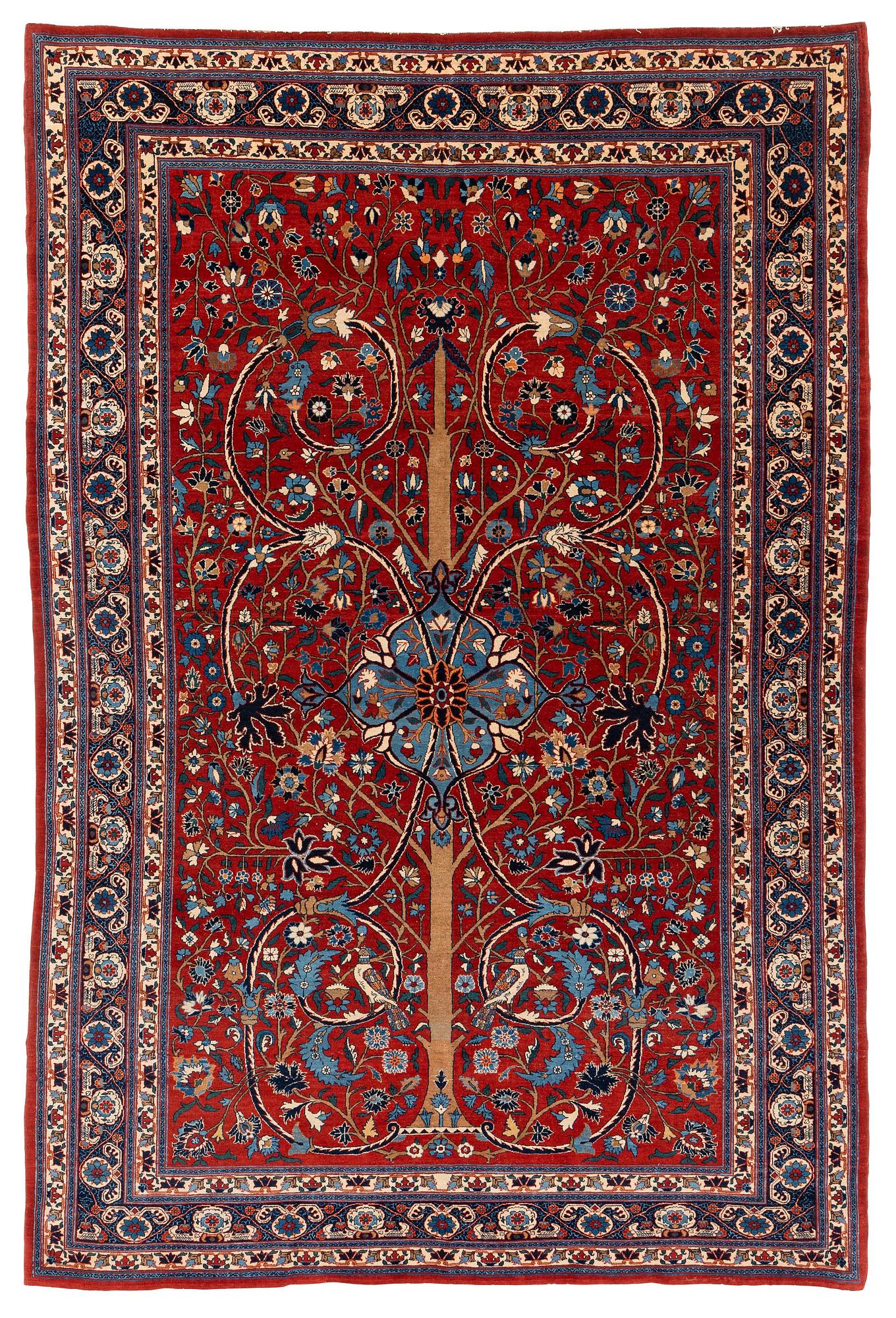 An antique/semi-antique, Teheran carpet, ca 314 x 211 cm.