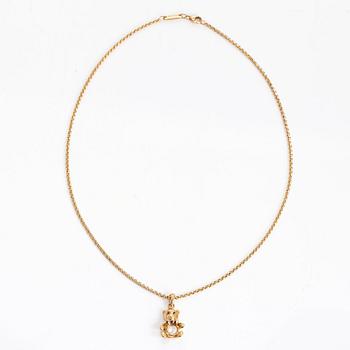 Chopard, an 18K gold 'Happy Diamonds Teddy Bear' pendant necklace.