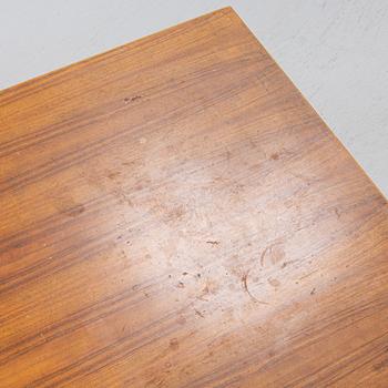 Florence Knoll, a model 590-036 walnut-veneered desk, by Nordiska Kompaniet in Sweden for Knoll International, 1962.