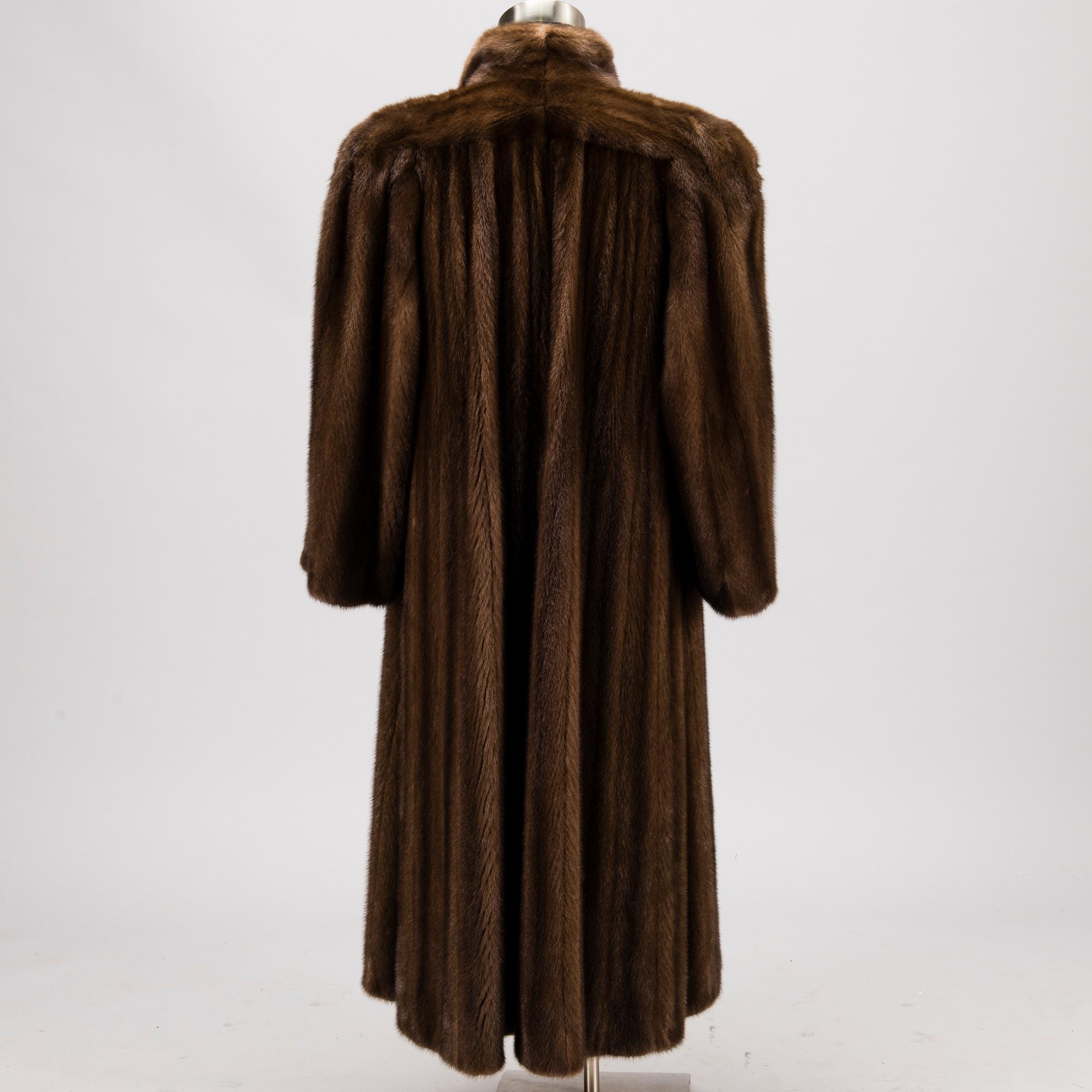 A Long Brown Mink Coat by Grosvenor to Harrods.