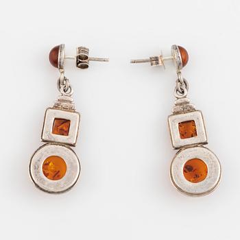 Silver and amber bracelet and earrings.