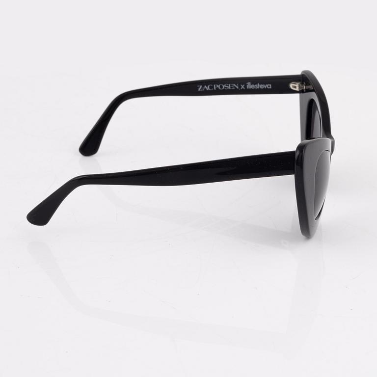 Illesteva, a pair of black "Zac posen x Illesteva" sunglasses.