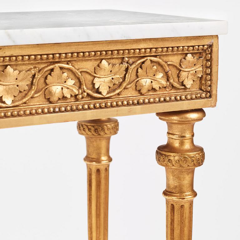 A late Gustavian carved giltwood and marble console table attributed to P. Ljung (1743-1819).