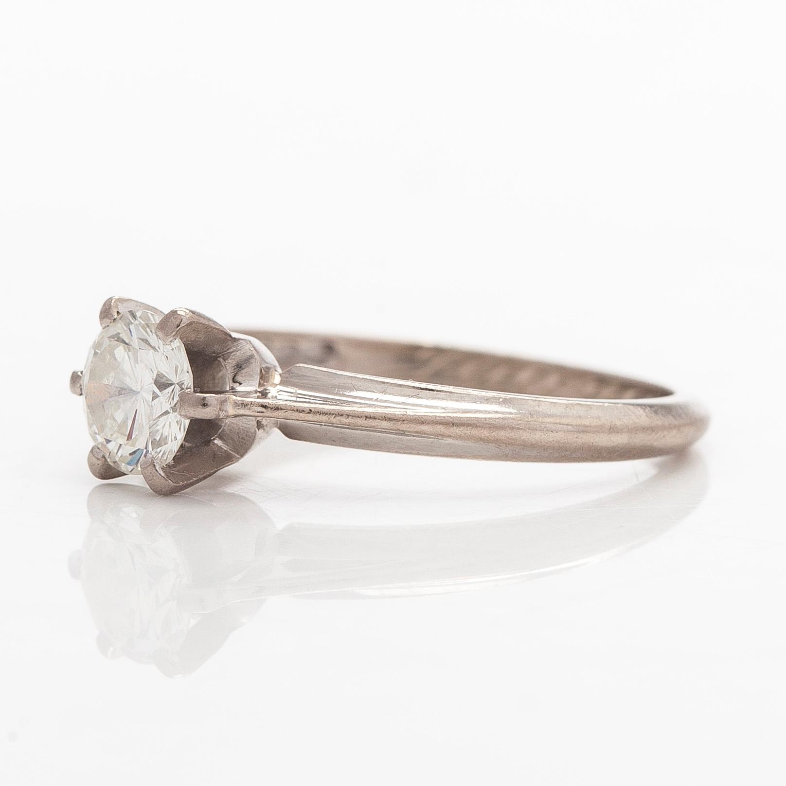 Ring, 18K vitguld med en briljantslipad diamant circa 0,62 ct, Kultakeskus 1988.