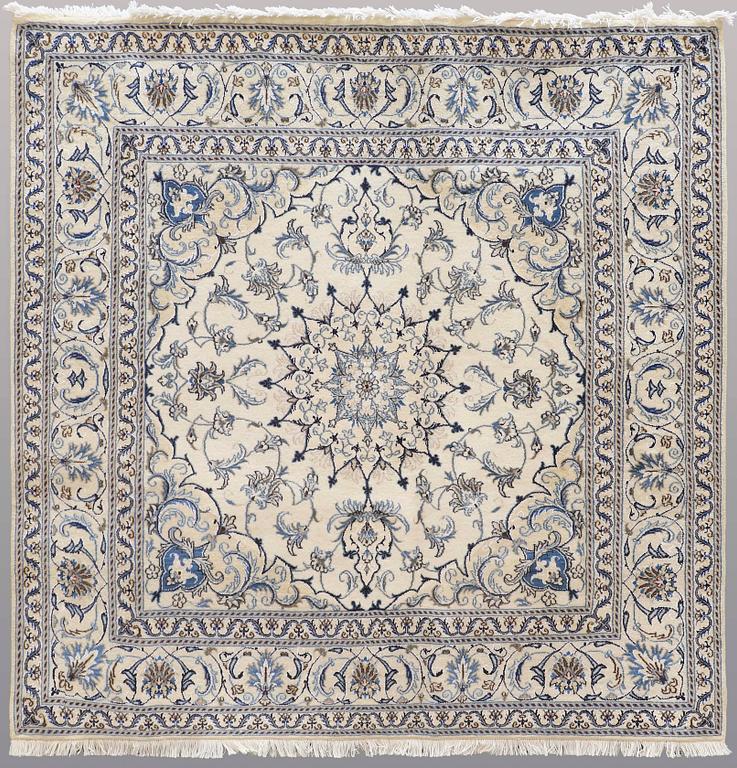 A rug, Nain part silk, ca 197 x 197 cm.