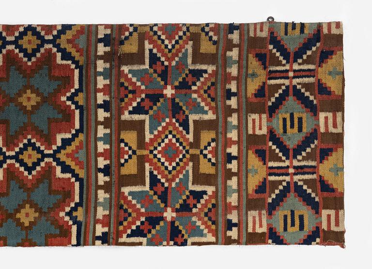 A flat weave 'Rosettes', Bench cushion c. 205 x 50 cm, Southwestern Scania, Sweden, first half of the 19th century.