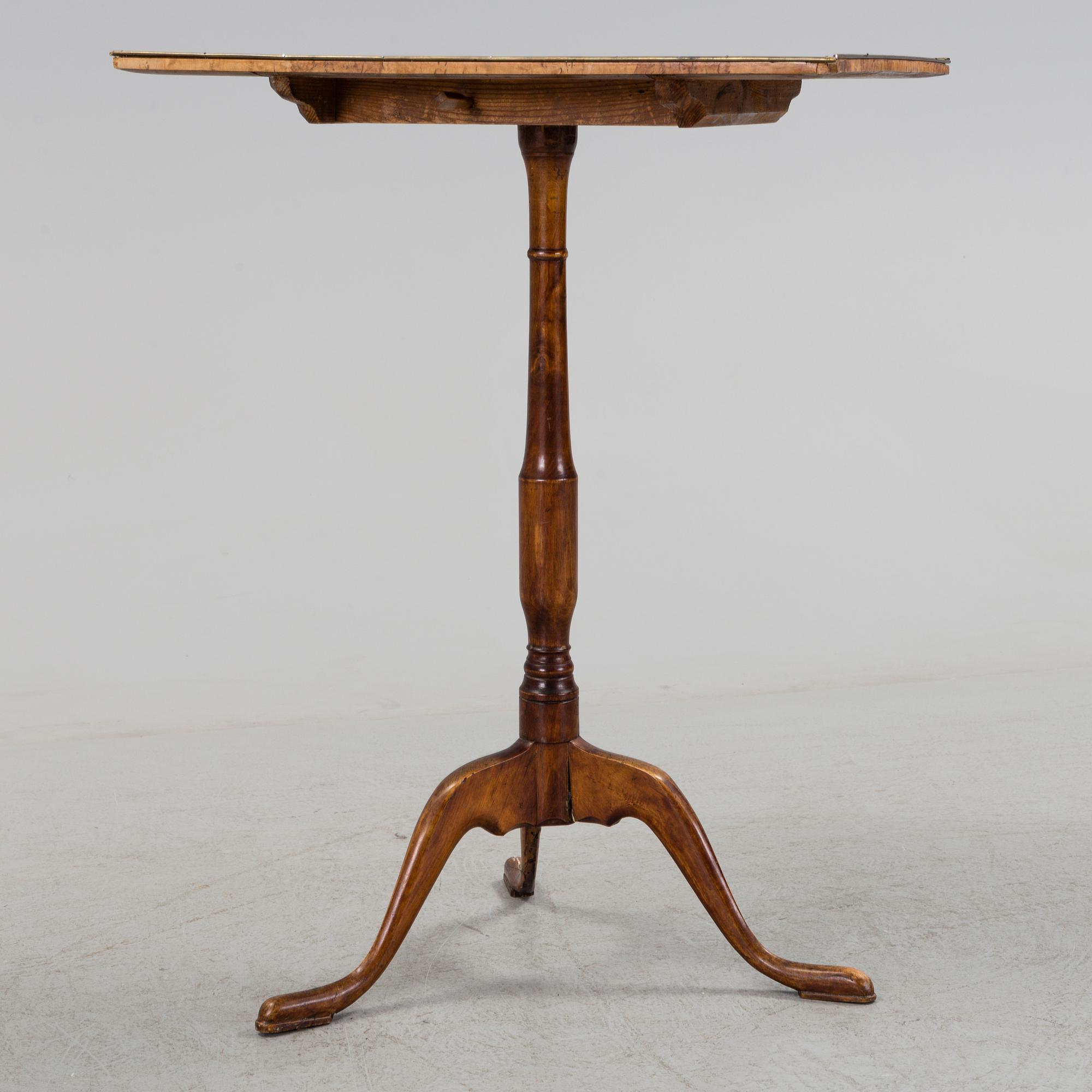 An early 19th century folding table.
