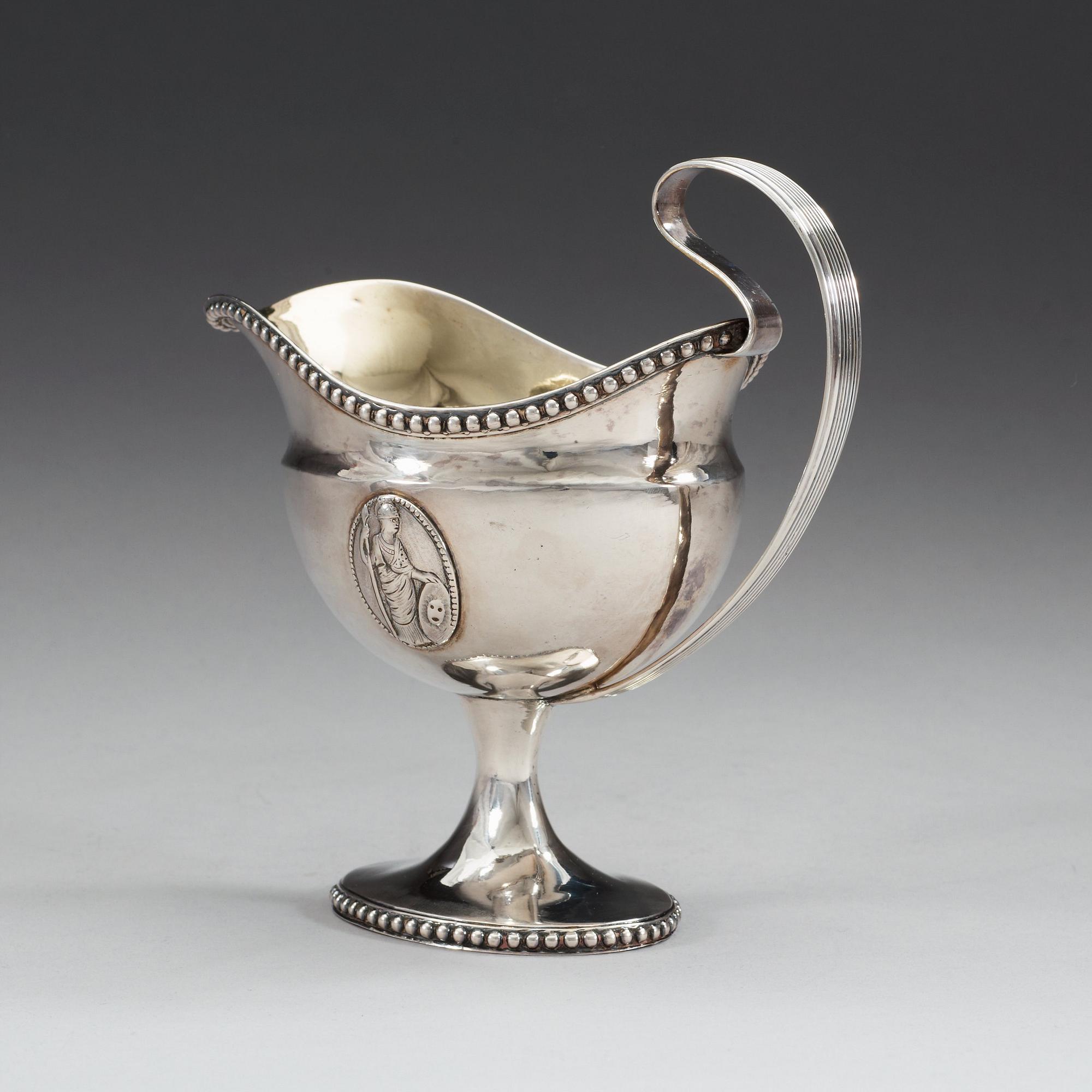A Swedish 18th century parcel-gilt cream-jug, makers mark of Anders Fredrik Weise, Stockholm 1794.