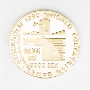 Medalj, 18K guld 3000 kr Carl XVI Gustaf, World Equestrian games Stockholm 1990 Sporrong  vikt ca 10,08 gram.