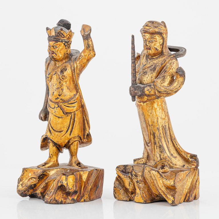 Two wooden figures of guardsmen, Qing dynasty, 19th Century.