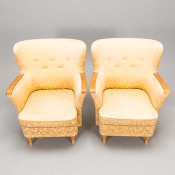 A pair of 1950's armchairs.