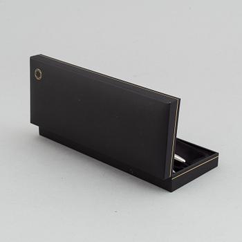 MOntblanc, a ball point pen and leather passport holder.