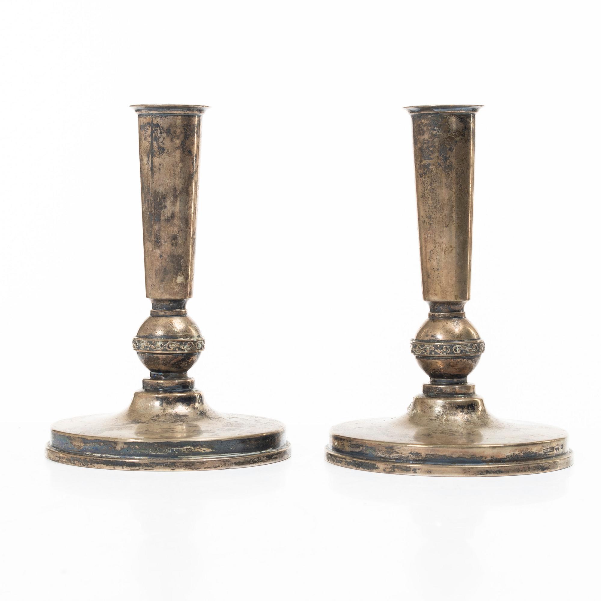 A pair of silver candelabra, MGAB, Uppsala 1951.