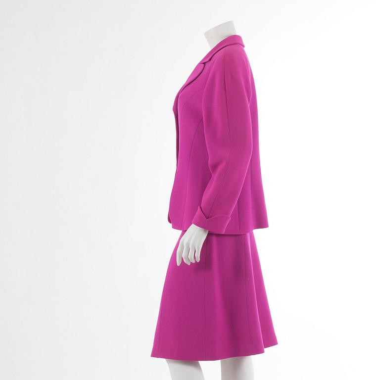 ESCADA, a hot pink wool two-piece suit consisting of a jacket and skirt. Size 42.