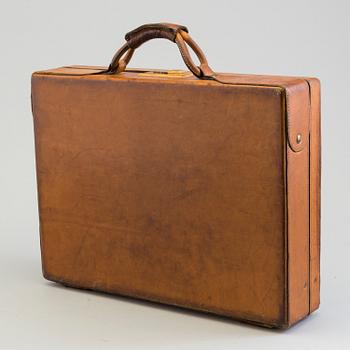 A leather brifcase, Hartman.