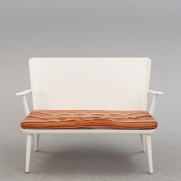 A second half of the 20th century sofa, pair of armchairs and coffee table by Göran Malmvall.