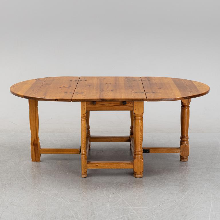 A baroque style gate-leg table, first half of the 20th century.