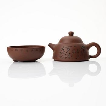 Wu Quan Xiang, A Chinese yixing teapot and a bowl with sieve and four cups, 1980s.