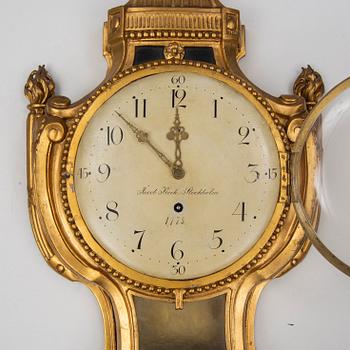 A gustavian wall clock by Jacob Kock, late 18th century.