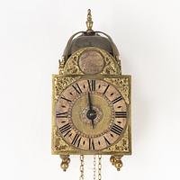 A George II brass lantern clock by John Wainwright (watchmaker in Wellingborough 1738-51).