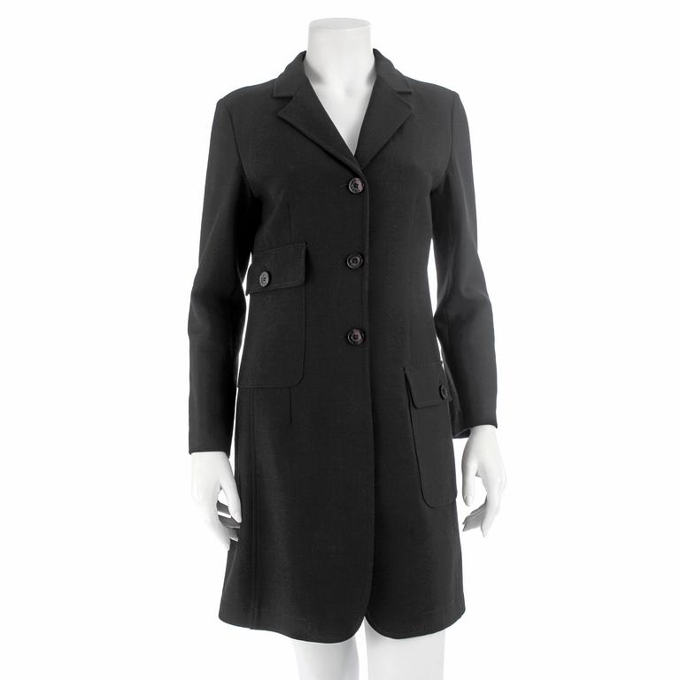 MOSCHINO, a black blendmaterial coat from the 1990s. Italian size 42.