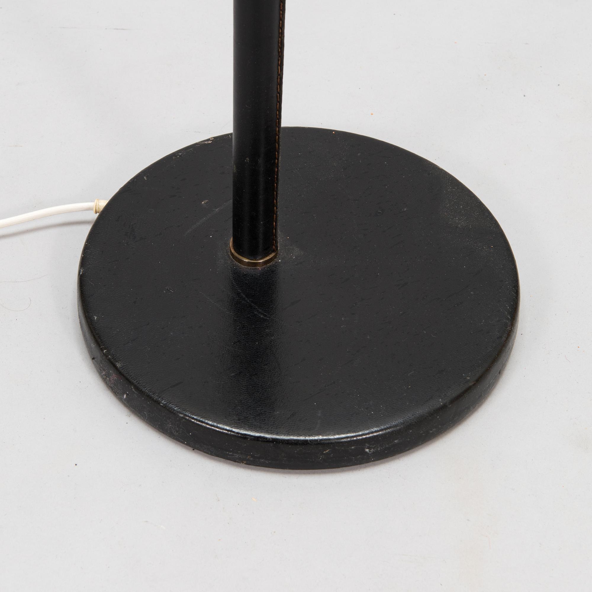 Alvar Aalto, an 'Angel's Wing' floor lamp. Manufactured by Valaistustyö.