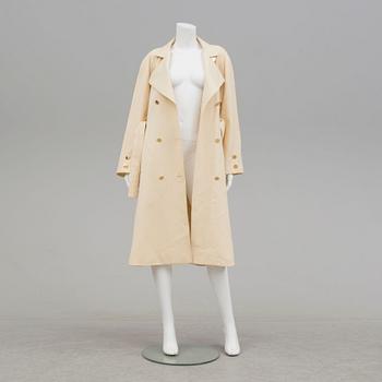 A trench-coat by Guy Laroche.