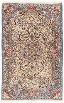 A rug, Kerman, ca 230 x 145 cm.