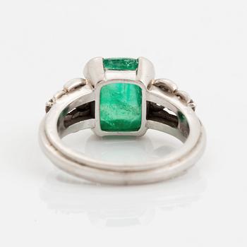 A WA Bolin 18K white gold ring set with a cabochon-cut emerald.