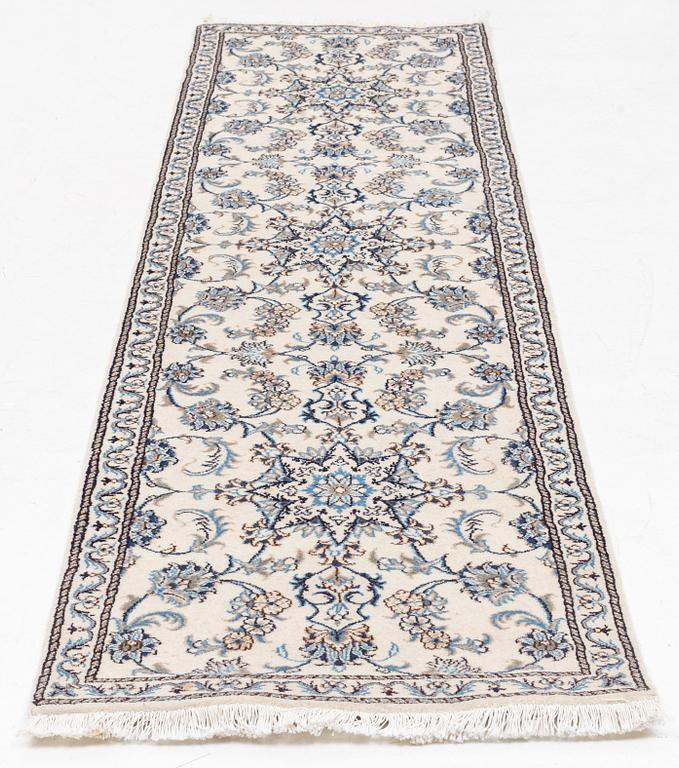 A runner carpet, Nain, ca. 299 x 76 cm.