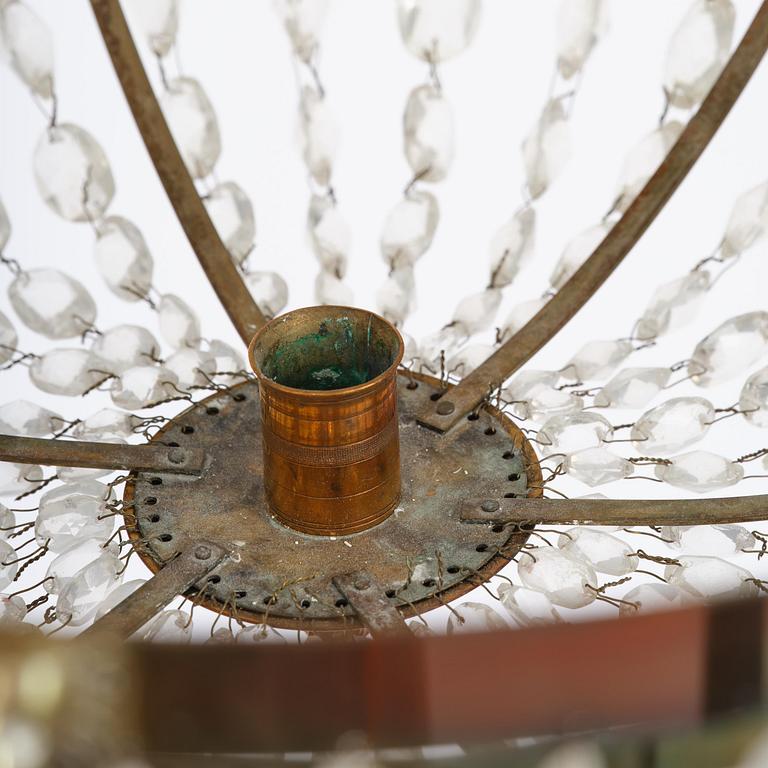 A late Gustavian gilt brass and cut glass seven-light chandelier, circa 1800.