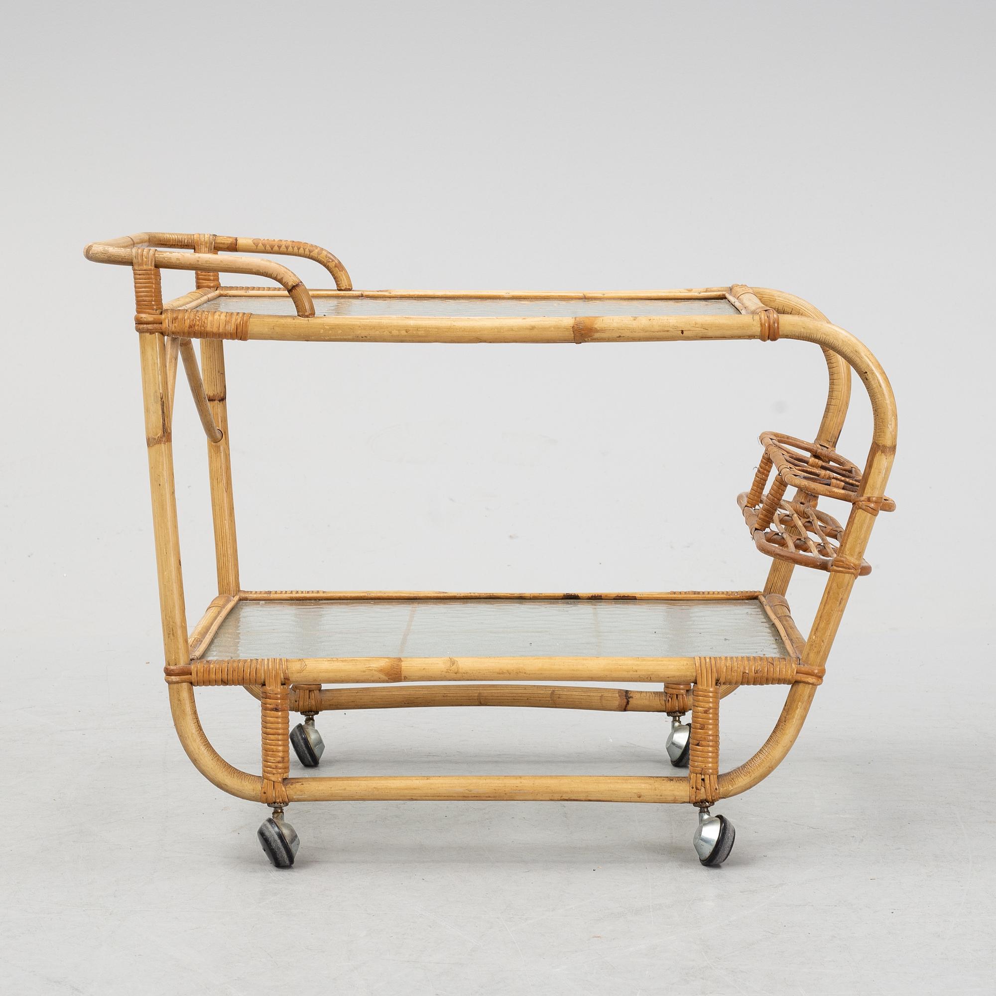 A second half of the 20th century rattan drinks trolley.