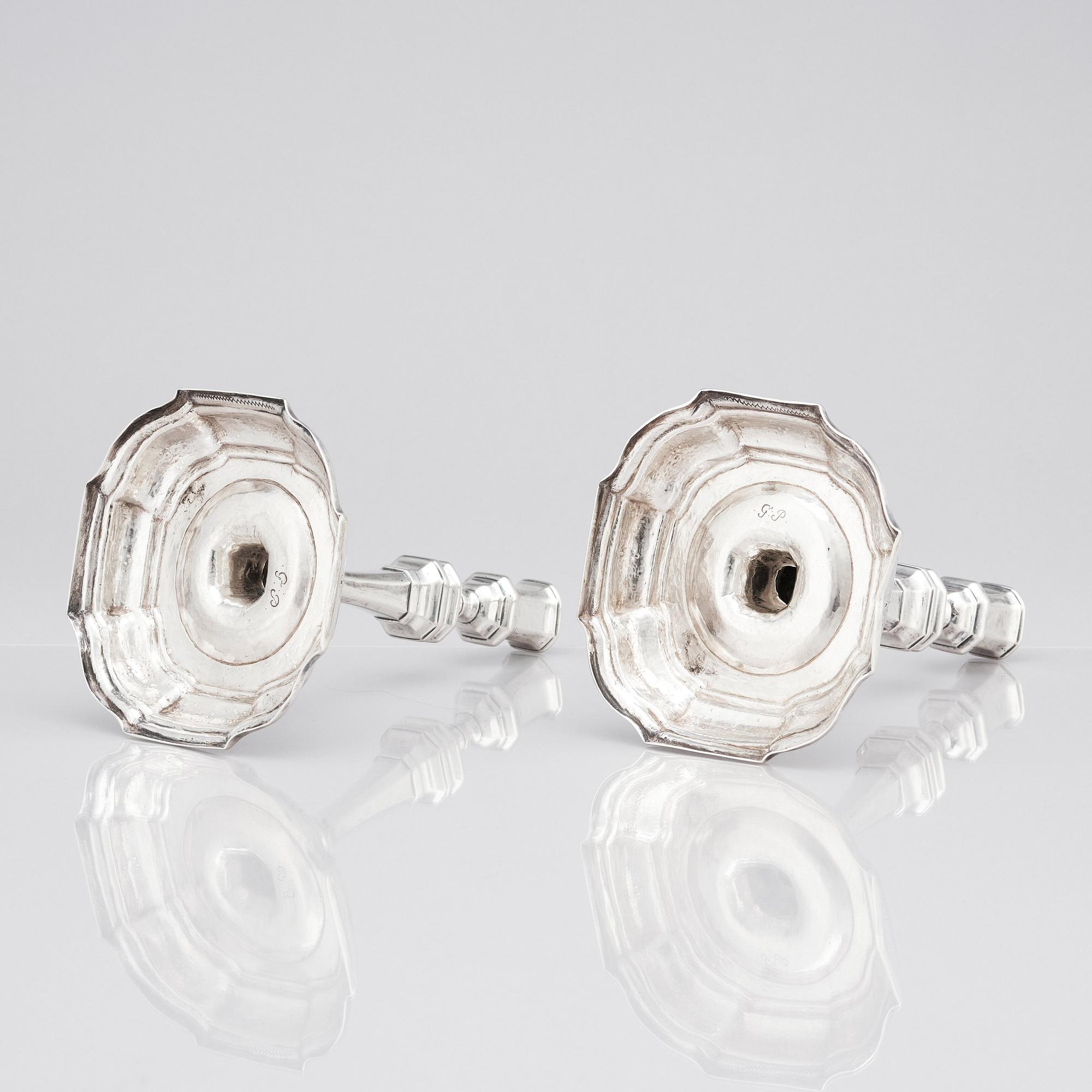 A pair of Swedish early 18th century silver candlesticks, mark of Petter Ersson Lund, Stockholm 1727.