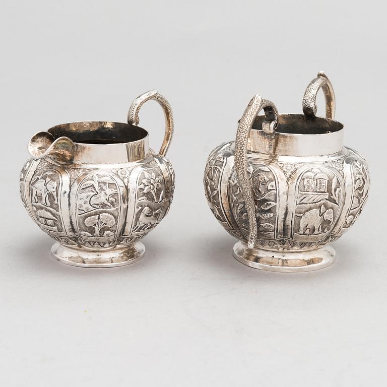 A 3-piece Asian silver tea set, presumably from the mid-20th century.