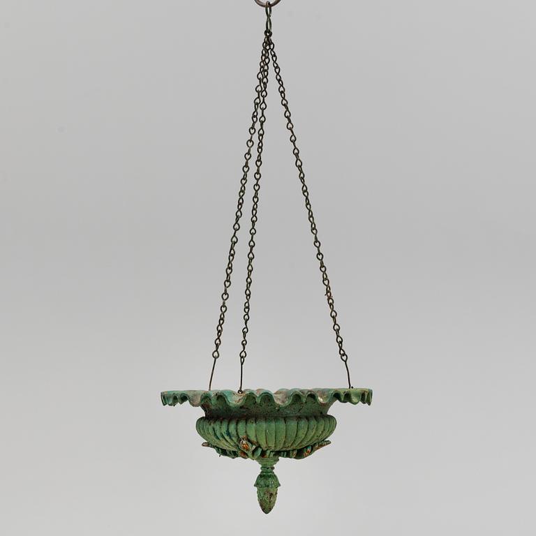 A CAST IRON  HANGING FLOWER POT, first half of the 20th century.