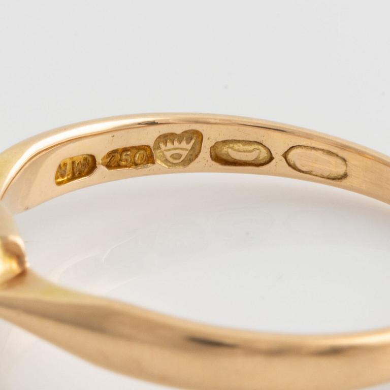 Ring in 18K gold with a brilliant-cut diamond of approximately 0.20 ct.