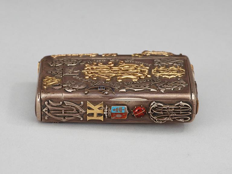 A CIGARRETTE Russian 19th century parcel gilt and enameld cigarette-case, makers mark of Michael Isakov, S.t Petersburg.