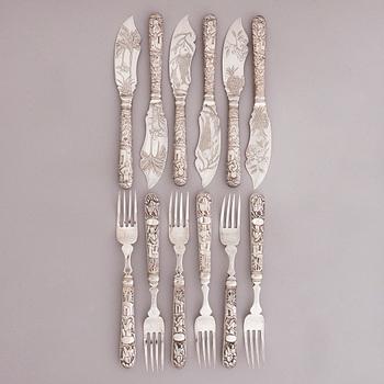 WING CHUNG, A 12-piece set of fish cutlery in silver, Hong Kong, end of the 19th Century.