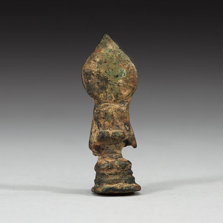 A miniature bronze figure of a enthroned seated Bodhisattva, presumably Tang dynasty (618-907).