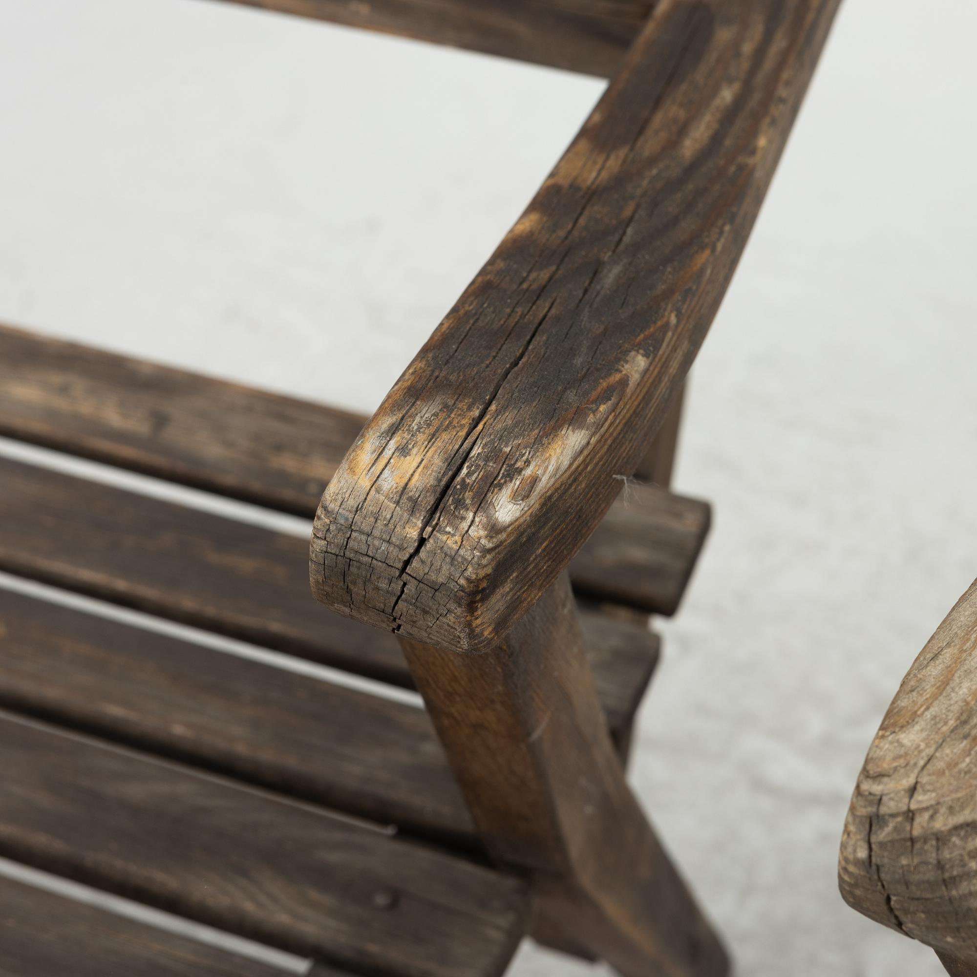 Carl Malmsten, garden furniture, a table and two armchairs. "Bergshamra", second half of the 20th century.