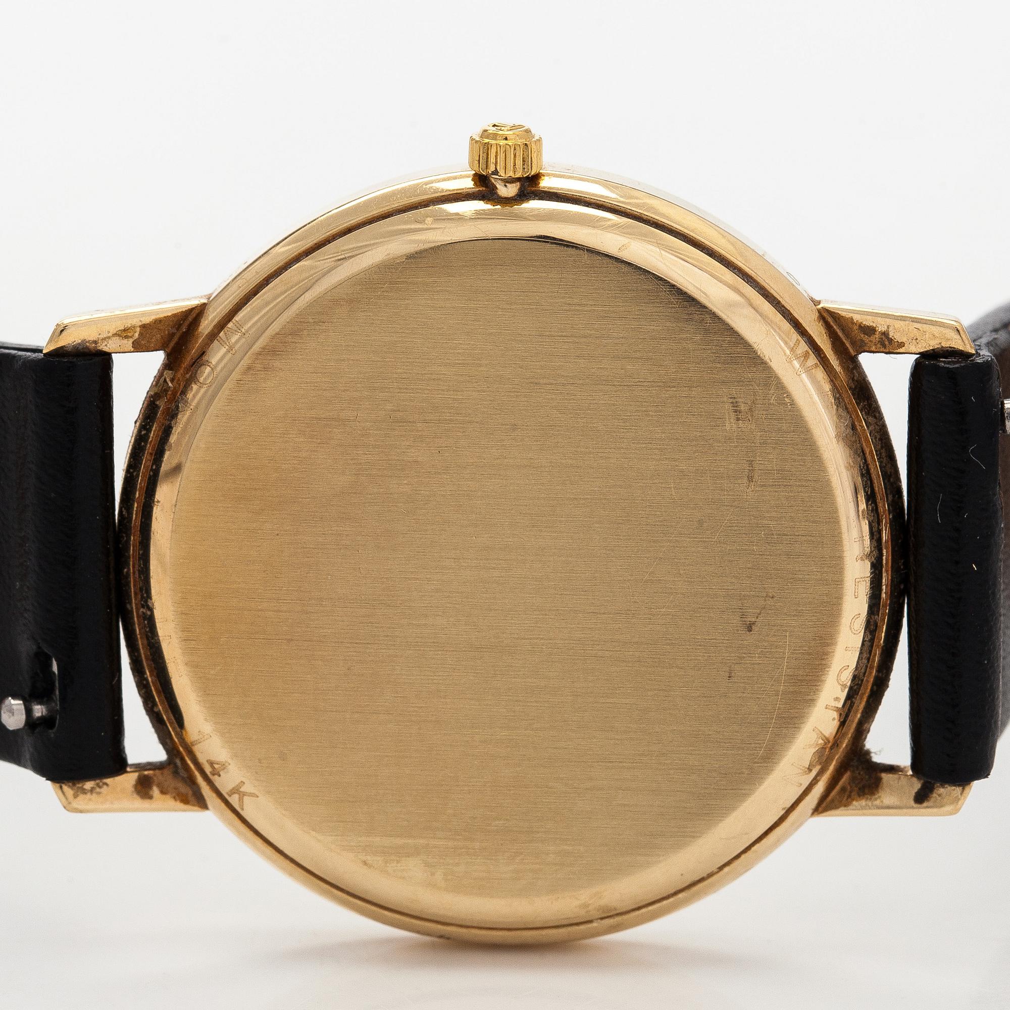 Tissot, wristwatch, 33.5 mm, 14K gold, quartz, sapphire crystal.