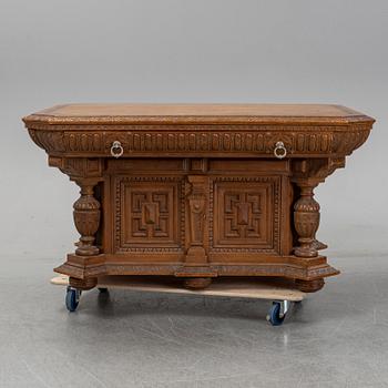 An oak library table, 1890's.