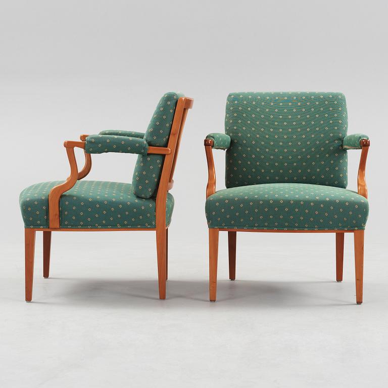 A pair of Josef Frank mahogany and rattan armchairs, Svenskt Tenn, model 969.