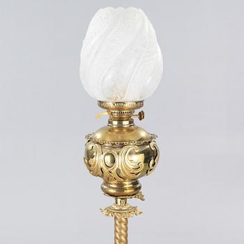 Two floor parafine lamps, 20th century.