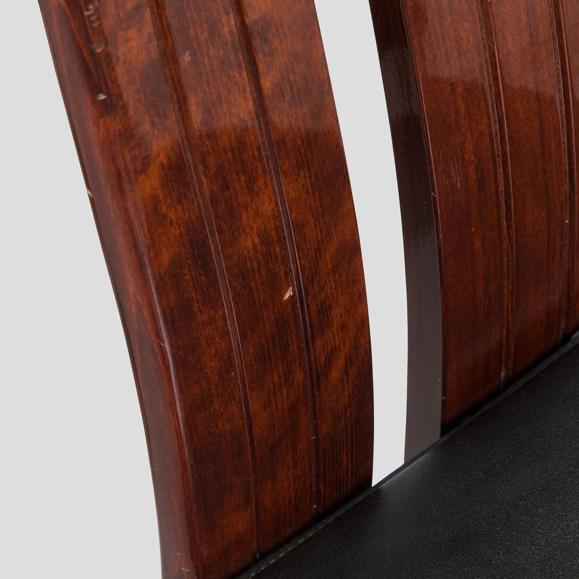 A set of eight dining chairs, Italy.