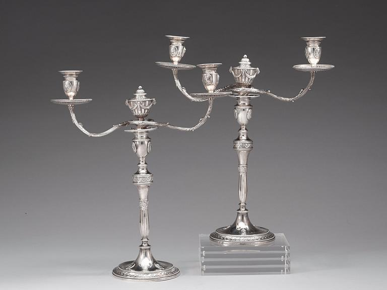 A pair of English 18th century silver candelabras, marks of Henry Hobdell, London 1778.